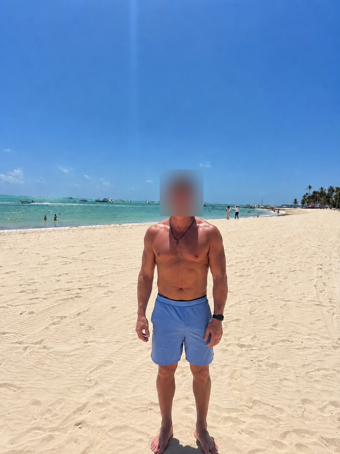 Profile photograph with face intentionally blurred